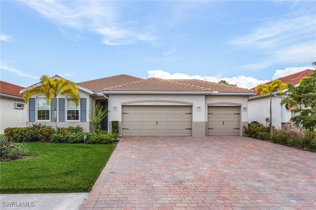 front view of a house with a yard