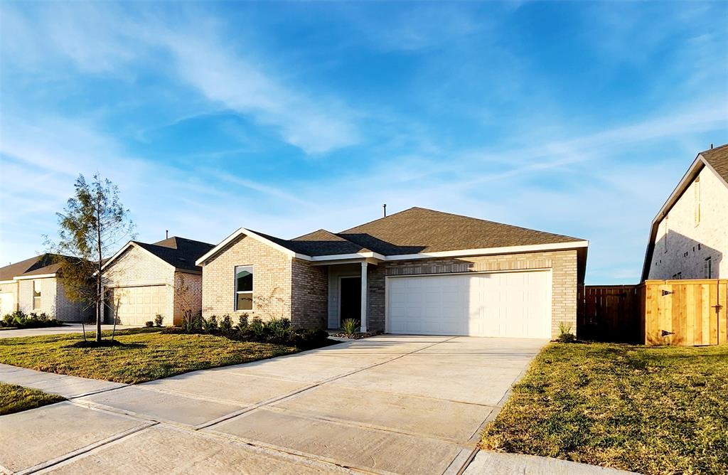 a front view of a house with yard