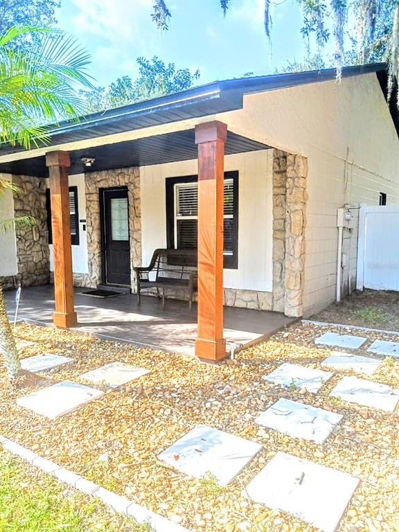 a view of a house with a patio