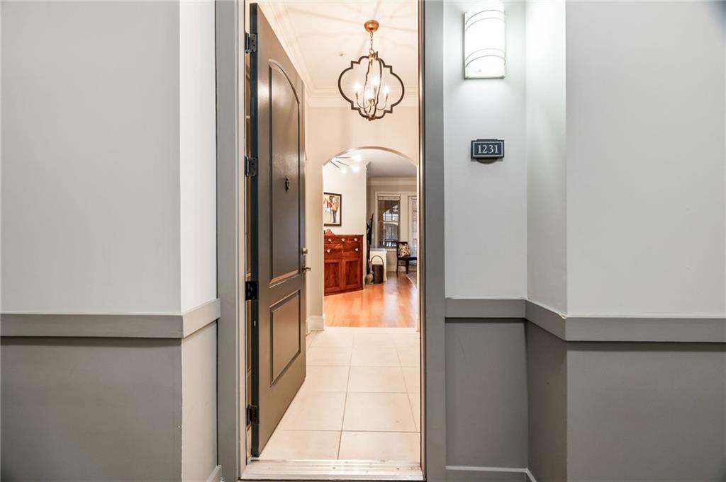 a hallway with wooden floor