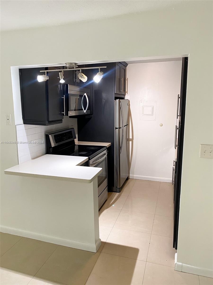 a utility room with washer and dryer