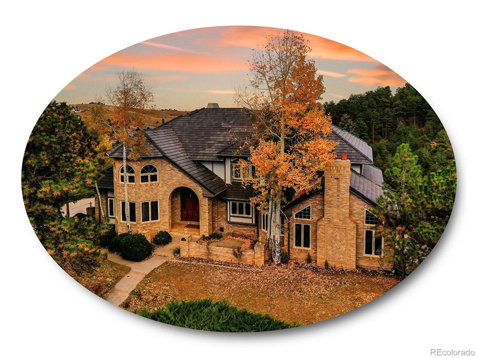 a view of a house with a backyard