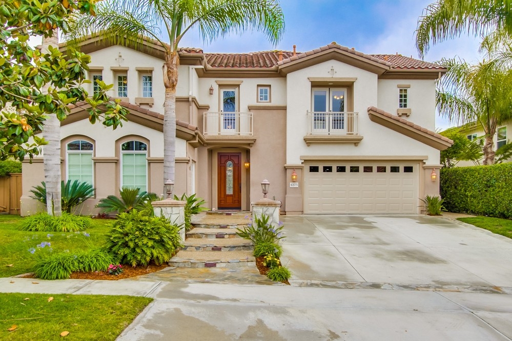 Mature palm trees and landscaping provides curb appeal.