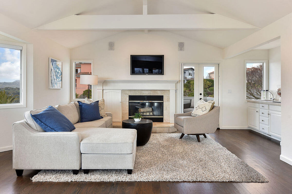 Updated, airy, elegant, bright, newly painted, and staged living room, after using concierge